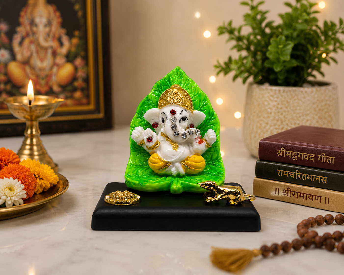 Lord Ganesha Idol with Green Leaf Backdrop & Golden Mouse
